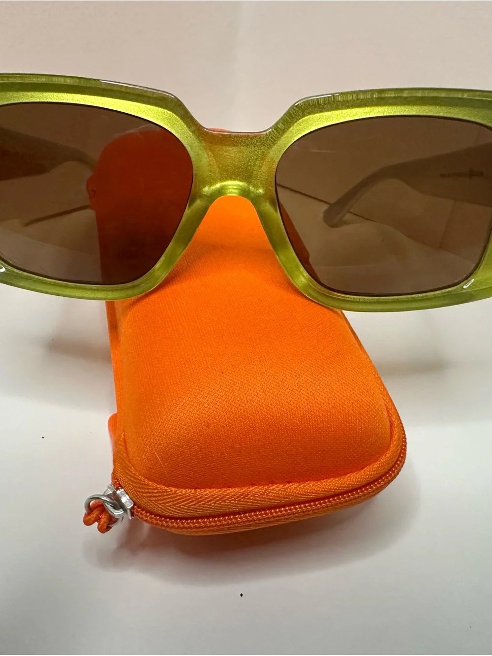 Max Studio Green Transparent Frame Sunglasses with Brown Lenses and Orange Case